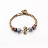 Elegante pulsera de cerámica geométrica.