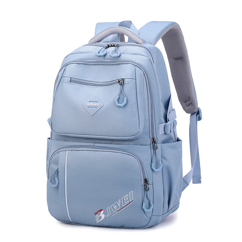 Sac à dos bleu multifonction en nylon pour femmes, idéal pour le voyage et l'université.