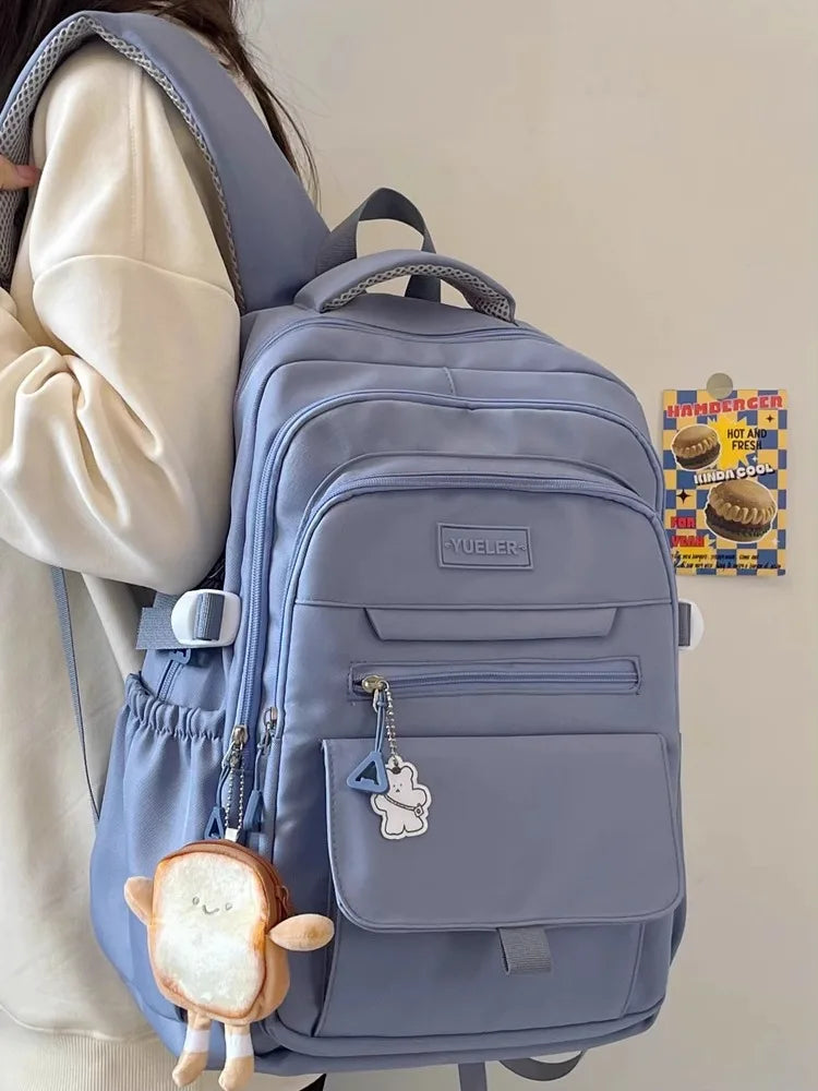 Sac à dos en nylon bleu, style japonais, grande capacité avec porte-clés en forme de pain grillé.