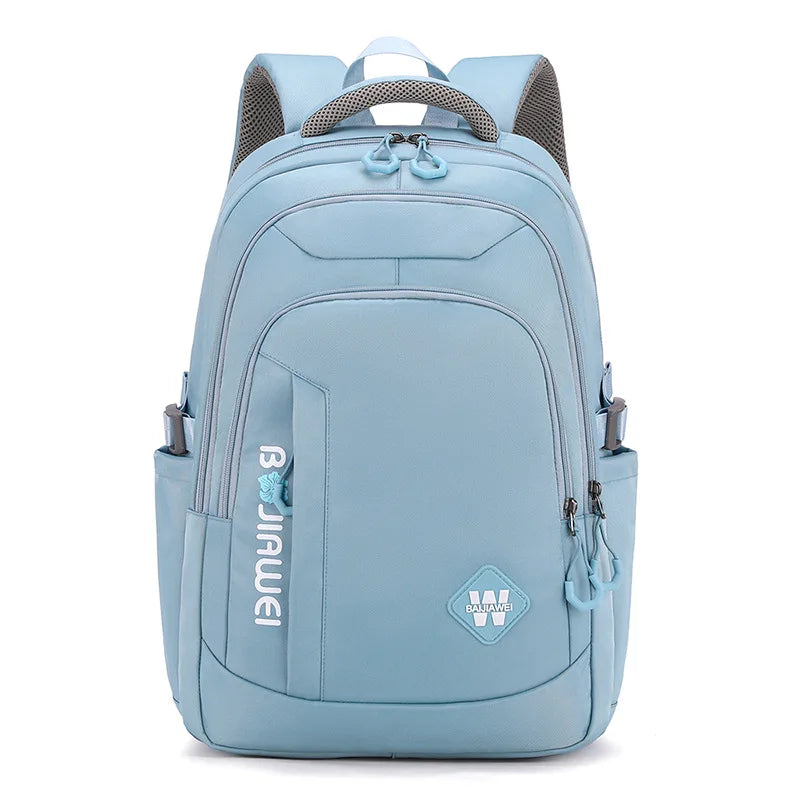Sac à dos femme en nylon bleu, élégant et multifonction, idéal pour voyages et études.