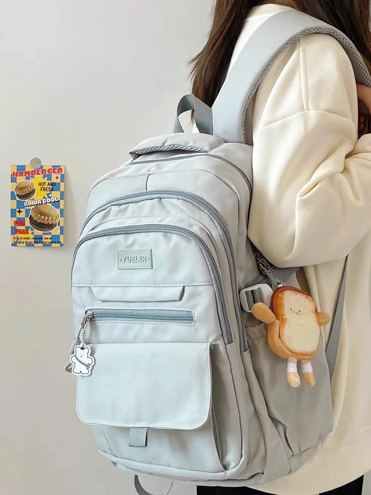 Sac à dos grand format en nylon avec un design japonais, idéal pour ordinateurs et effets scolaires.