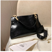 Cross-body handbag in soft faux leather