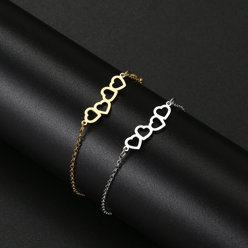 Elegant stainless steel bracelet with hollow heart designs