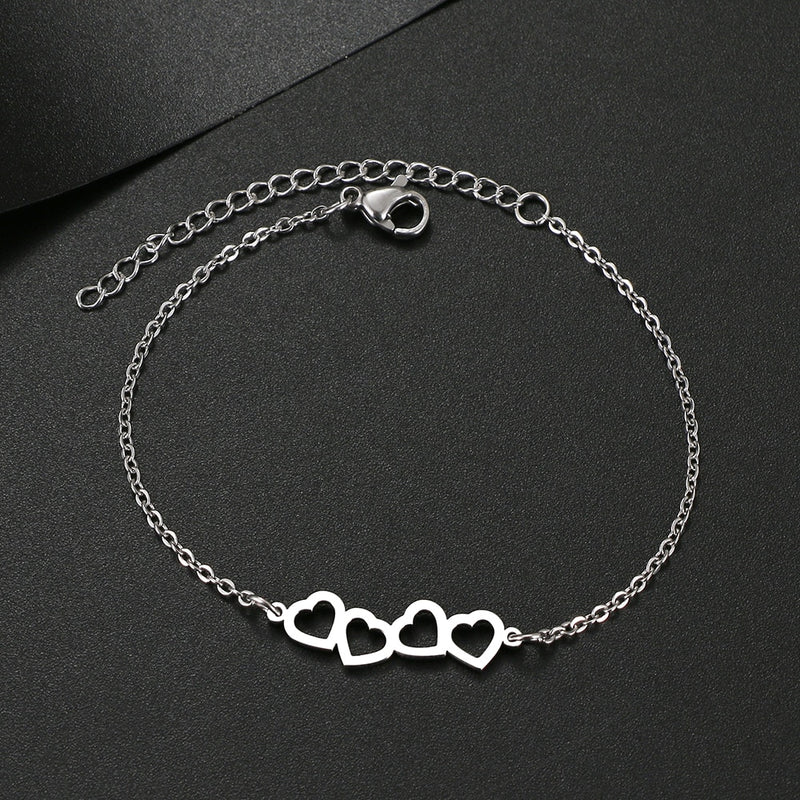 Bracelet en acier Inoxydable élégant avec motifs en forme de cœur creux