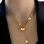 Collier long en acier avec pendentif cœur