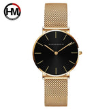 Montre femme Hannah Martin noire avec boîtier et bracelet maille milanaise dorés