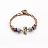 Elegante pulsera de cerámica geométrica.