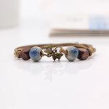 Elegante pulsera de cerámica geométrica.