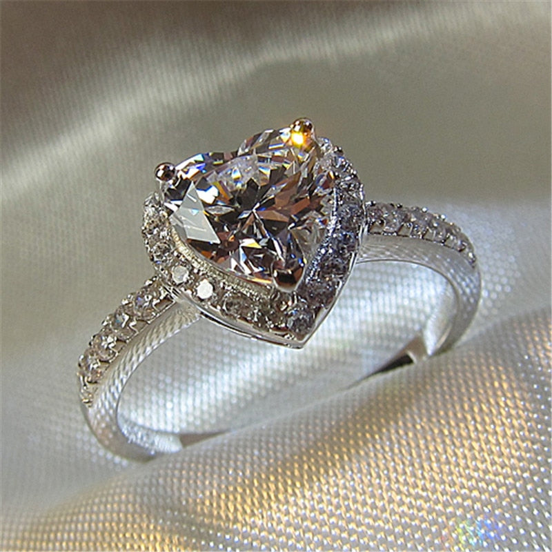 Silver-colored ring set with heart-shaped stone