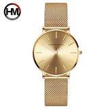 Montre femme Hannah Martin cadran vert émeraude et bracelet maille milanaise doré