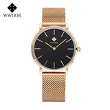 Montre femme WWOOR or rose avec cadran blanc, vue de côté élégante