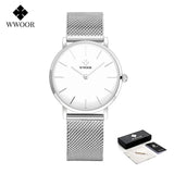 Montre femme WWOOR argentée avec cadran blanc, bracelet maille milanaise, packaging inclus