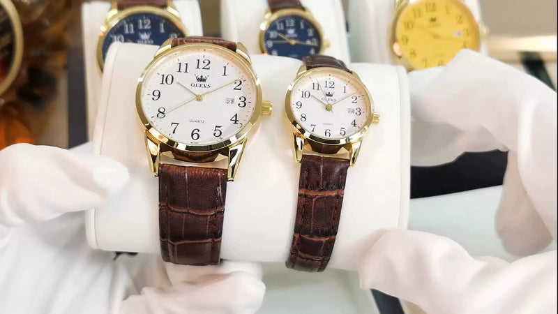 Montres OLEVS classiques pour femme avec cadran blanc et bracelet en cuir marron en gros plan