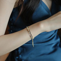 Sparkling gold charm bracelet
