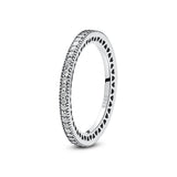 Bague en argent 925 avec un design de vagues ou de courbes, ornée de zircons scintillants