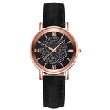 Montre femme quartz rose portée au poignet, élégante et discrète