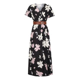 Robe longue fleurie noire à plat avec ceinture marron, vue de face