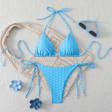 Maillot de bain deux pièces bleu ciel à pois blancs avec détails perlés