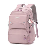Sac à dos femme en nylon multifonction rose avec poches et fermeture éclair, idéal pour le travail et les voyages.