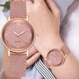 Montre femme quartz rose avec cadran chiffres arabes et bracelet en cuir