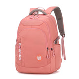 Sac à dos femme multifonction en nylon rose avec compartiment ordinateur, idéal pour le style collège.