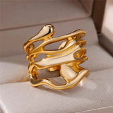 Bague dorée géométrique abstraite