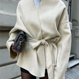 Veste en laine élégante avec ceinture et lacets pour femme