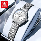 Montre femme OLEVS argentée avec cadran blanc épuré