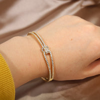 Sparkling women's bracelet with zircons