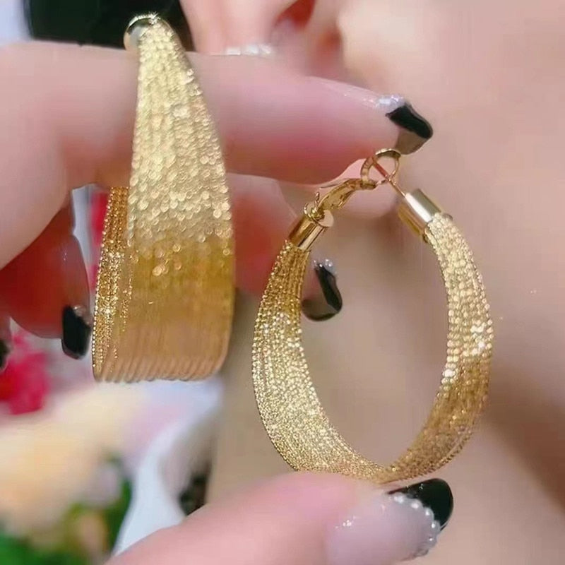 Hoop earrings in gold metal
