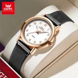 Montre femme élégante maille milanaise noire et rose doré, cadran blanc avec chiffres arabes