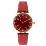 Montre femme bracelet cuir rouge, cadran rouge chiffres romains dorés et strass, sur fond blanc