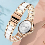 Montre quartz femme bracelet bicolore blanc et doré rose avec boucle déployante, élégance au poignet