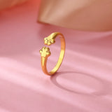 Bague dorée ajustable avec motif croix et zircons