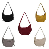 Détail de la bandoulière ajustable du sac 'Dumpling'