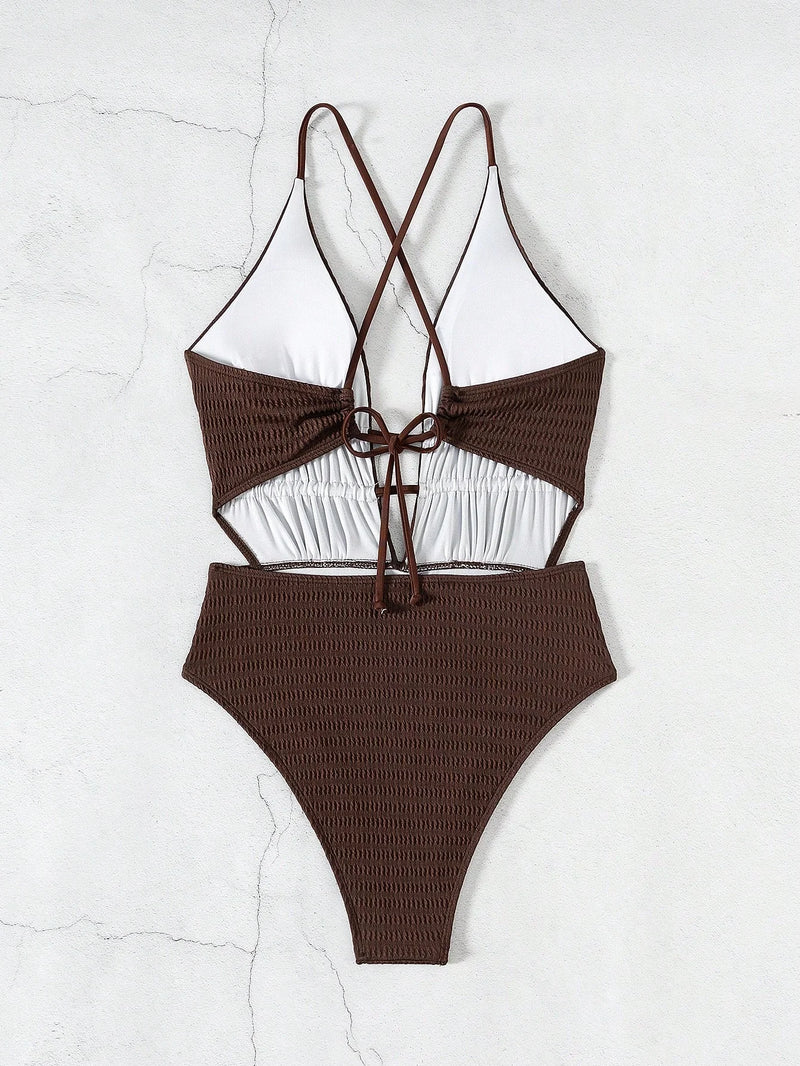 Vue de dos du maillot de bain une pièce brun texturé avec bretelles croisées et fermeture à nouer
