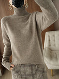 Pull en laine mérinos col montant