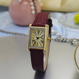 Montre femme cadran blanc chiffres romains, bracelet noir