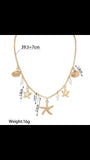 Collier bohème doré avec pendentifs étoiles de mer et coquillages, dimensions indiquées