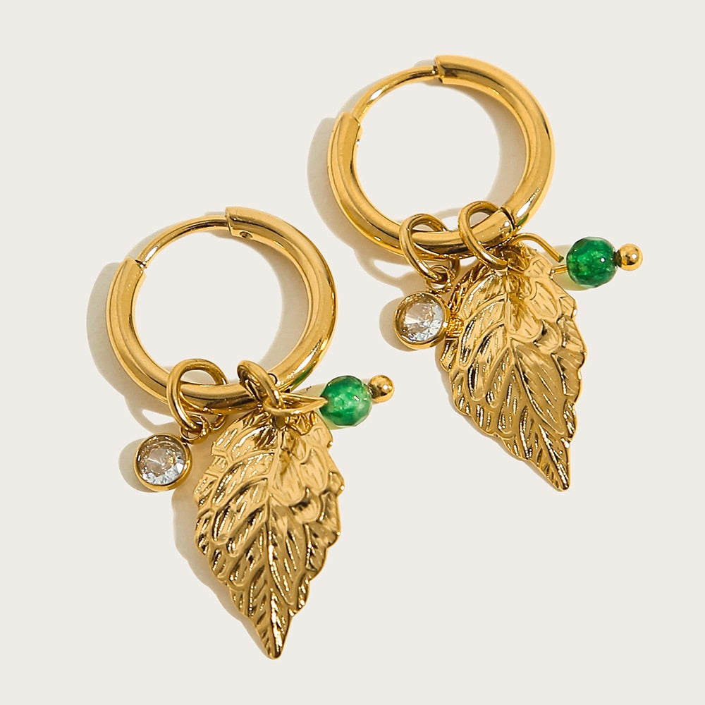 Gold plated earrings with natural stone charms