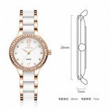 Montre quartz femme bracelet bicolore noir et argenté avec boucle déployante, finition soignée et chic