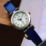 Montre vintage femme Emakujitia avec bracelet en cuir bleu et cadran chiffres romains