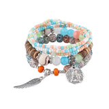 Ensemble de bracelets bohèmes multicolores avec perles en bois, breloque tour Eiffel et aile d'ange argentées