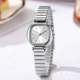 Montre quartz femme argentée, cadran carré gris, bracelet acier inoxydable fin