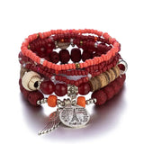 Ensemble de bracelets bohèmes avec perles de différentes tailles et couleurs, un gland et une breloque en forme de cœur