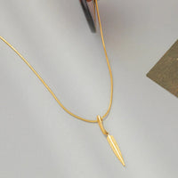 Gold necklace with leaf pendant