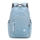 Sac à dos femme en nylon bleu, multifonction avec compartiment ordinateur, style collège, design moderne et pratique.