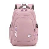 Sac à dos femme multifonction en nylon rose, design élégant avec compartiment pour ordinateur portable.
