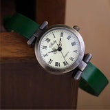 Montre vintage femme Emakujitia avec bracelet en cuir vert et cadran chiffres romains