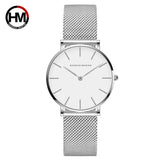 Montre femme Hannah Martin cadran noir et bracelet maille milanaise doré